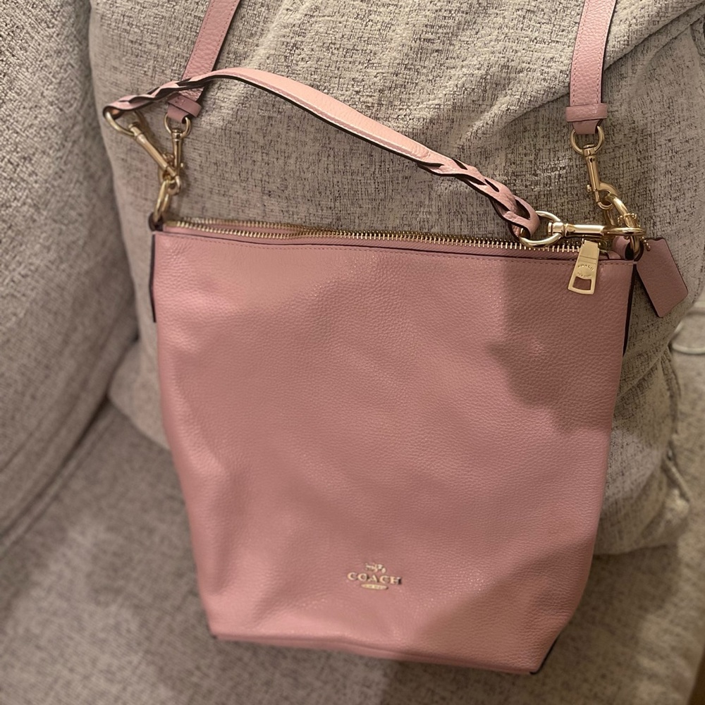 Pink Coach handbag.  Very good condition.  Only used once.  Has crossbody strap.